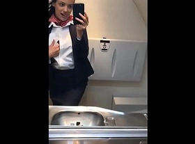Latina stewardess joins the masturbation mile high club in the lavatory and cums