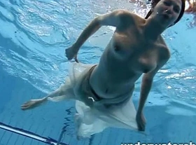 Andrea shows nice body underwater